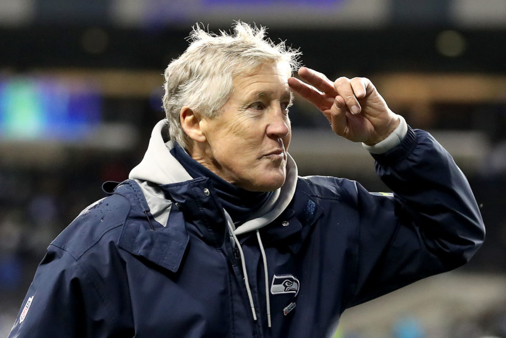 Seattle Seahawks Head Coach Pete Carroll salutes