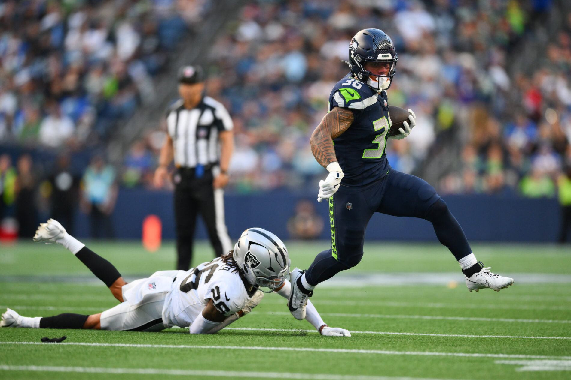 Seahawks-RB George Holani scors a Rushing Touchdown against th eLas Vegas Raiders in Week 1 of the 2025 NFL-Preseason - Seahawks Offense 2025 Preview
